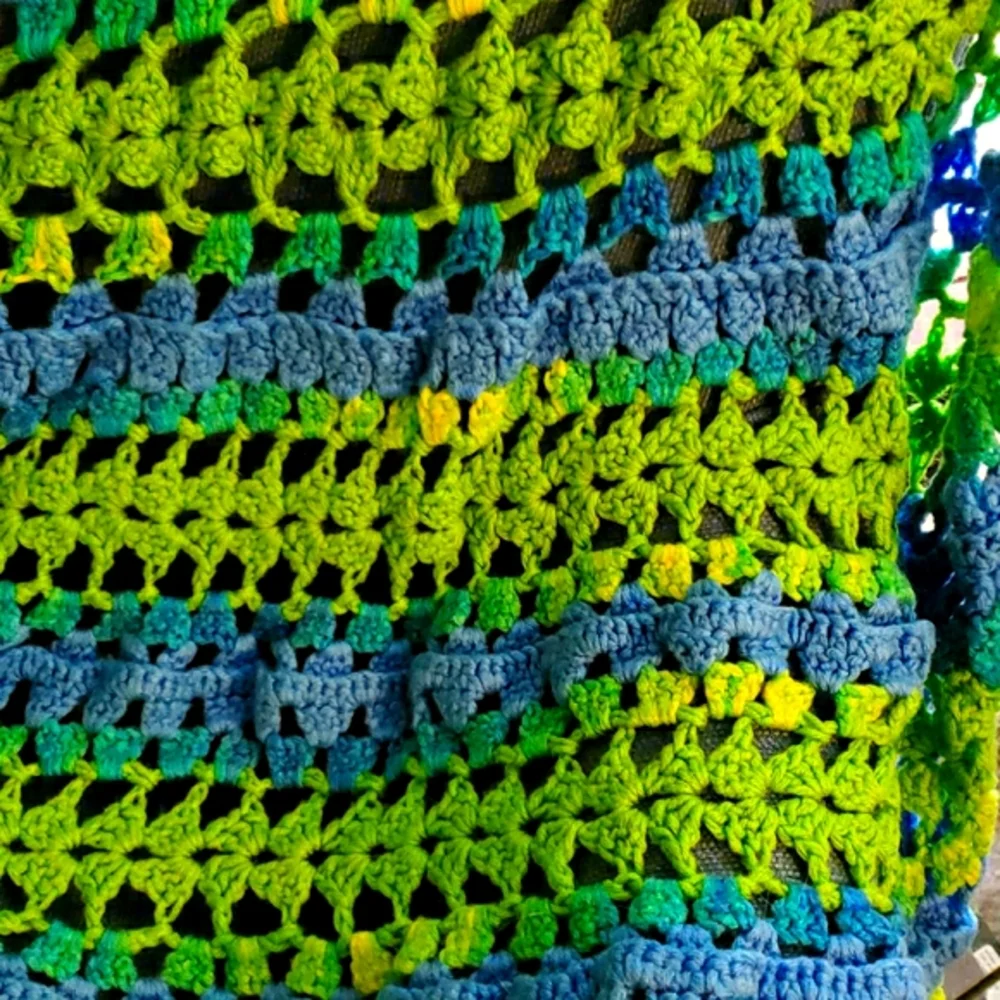 Mile a minute afghan in lime green, bright blue